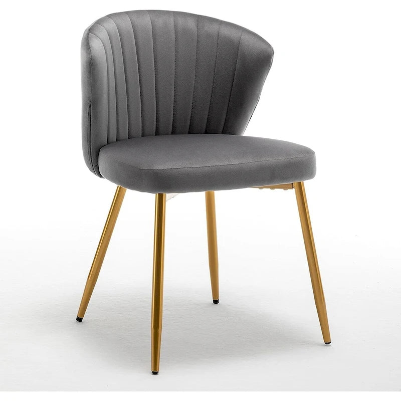 Fauteuil d'appoint moderne en velours avec design capitonné, assise sans accoudoirs confortable et tendance.