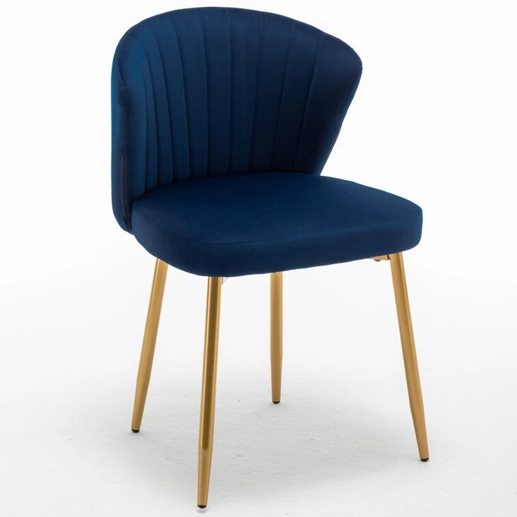 Fauteuil d'appoint moderne en velours avec design capitonné, assise sans accoudoirs confortable et tendance.