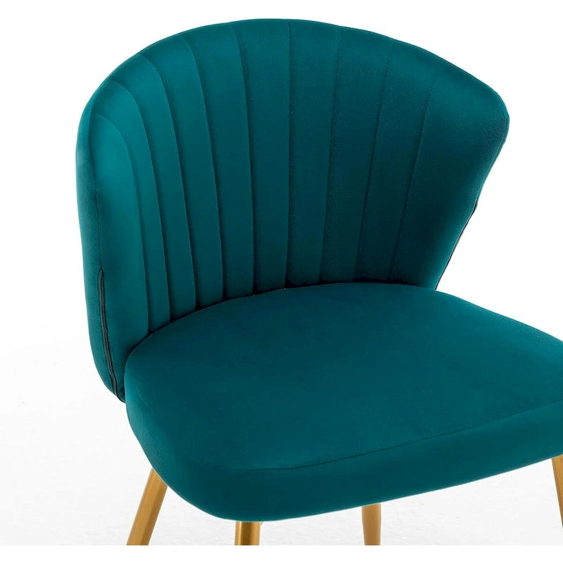 Fauteuil d'appoint moderne en velours avec design capitonné, assise sans accoudoirs confortable et tendance.