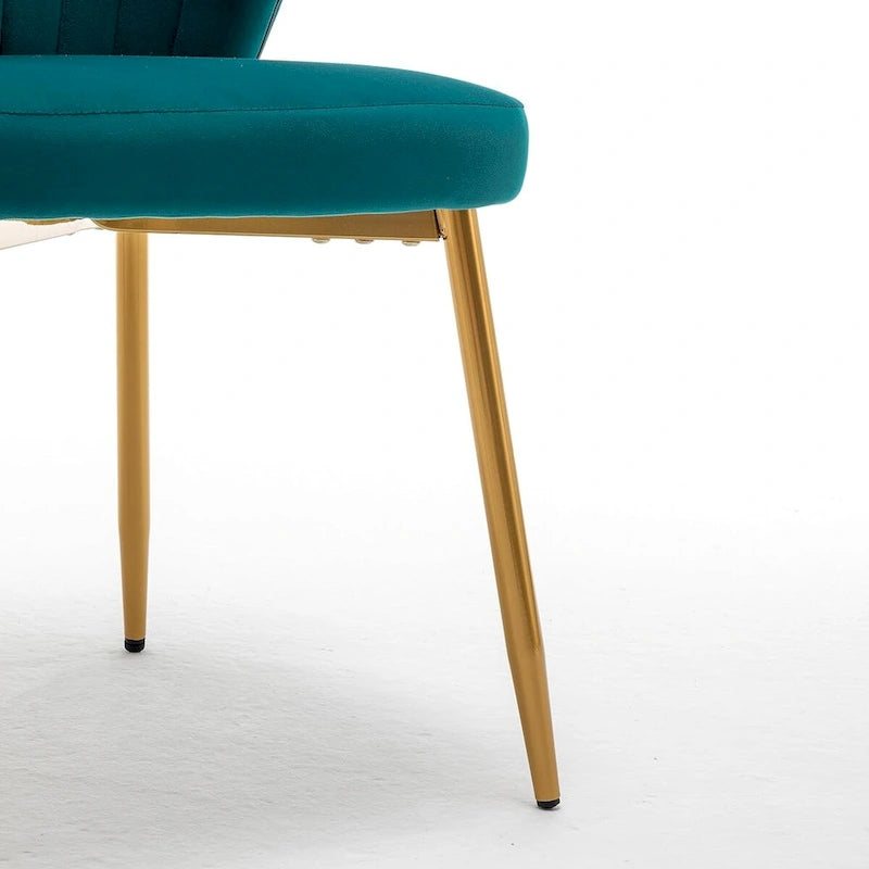Fauteuil d'appoint moderne en velours avec design capitonné, assise sans accoudoirs confortable et tendance.