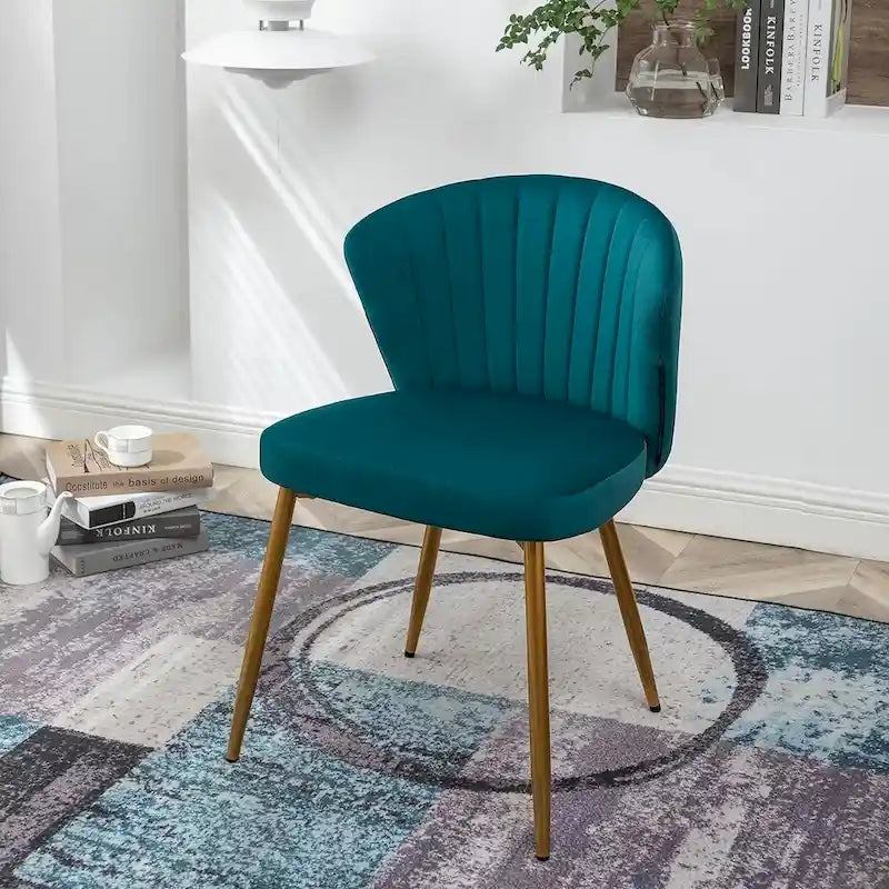 Fauteuil d'appoint moderne en velours avec design capitonné, assise sans accoudoirs confortable et tendance.
