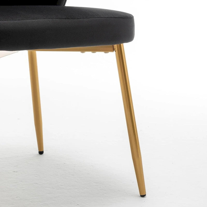 Fauteuil d'appoint moderne en velours avec design capitonné, assise sans accoudoirs confortable et tendance.