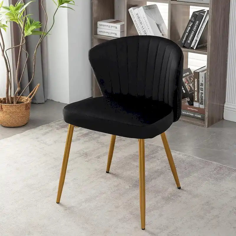 Fauteuil d'appoint moderne en velours avec design capitonné, assise sans accoudoirs confortable et tendance.